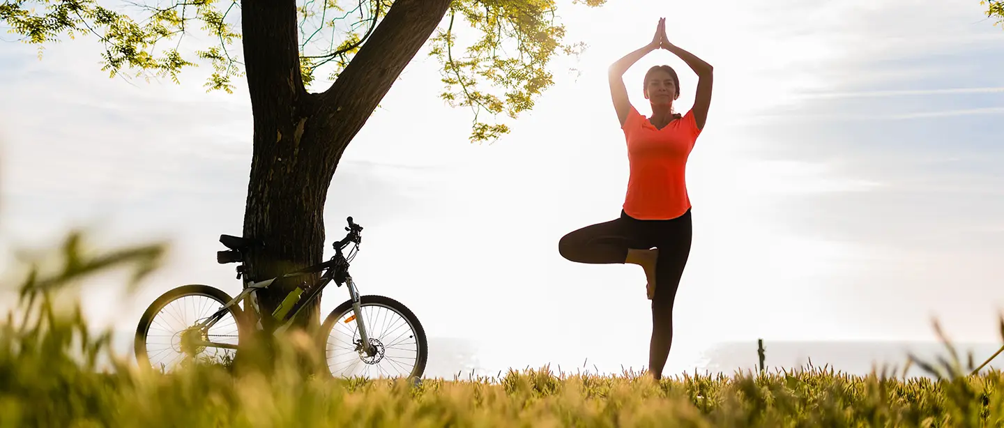 Smiling elderly man hugging young woman
